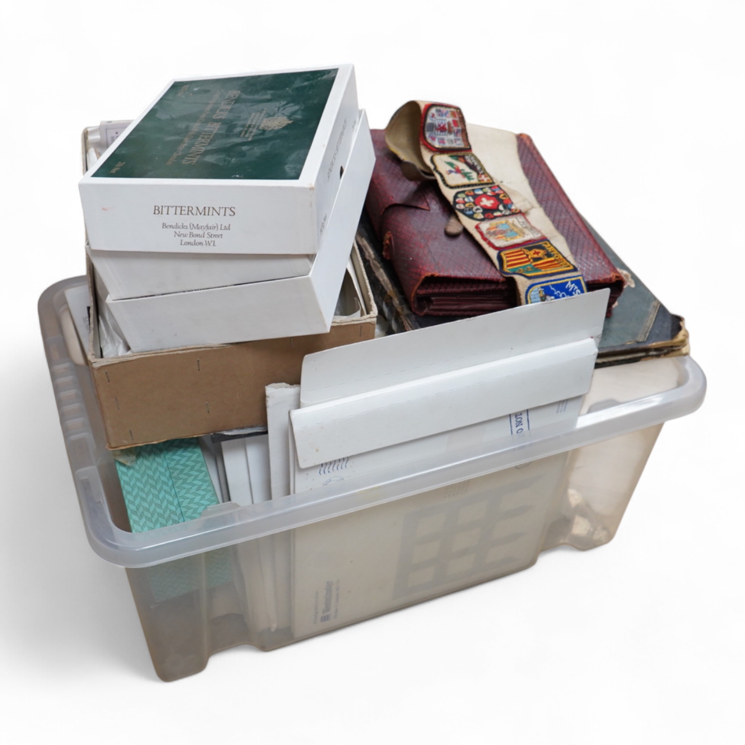 A collection of sundry items to include a scrapbook and a large collection of various stamps